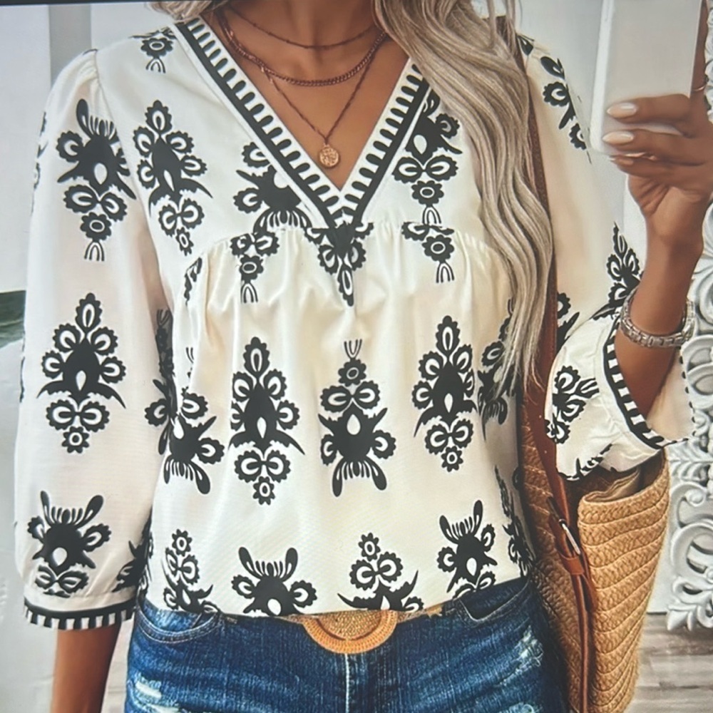 Black and White Graphic Blouse with V-Neckline